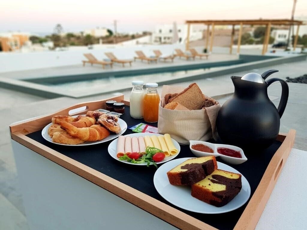 Фотографія Mylithos Suites 4*