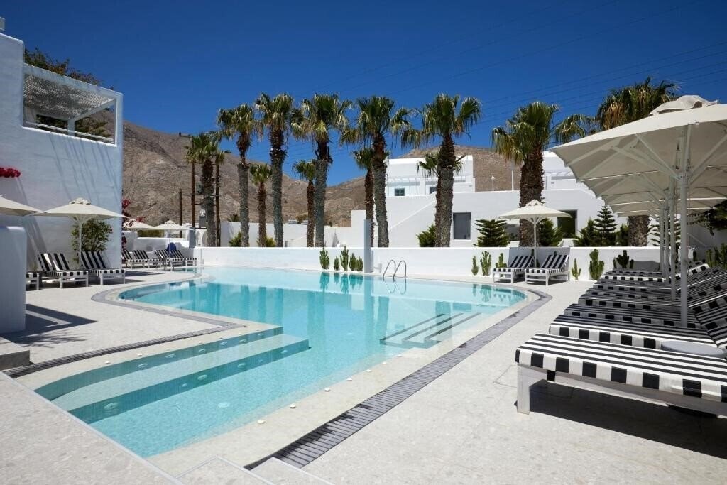 Готель Kouros Village 4*
