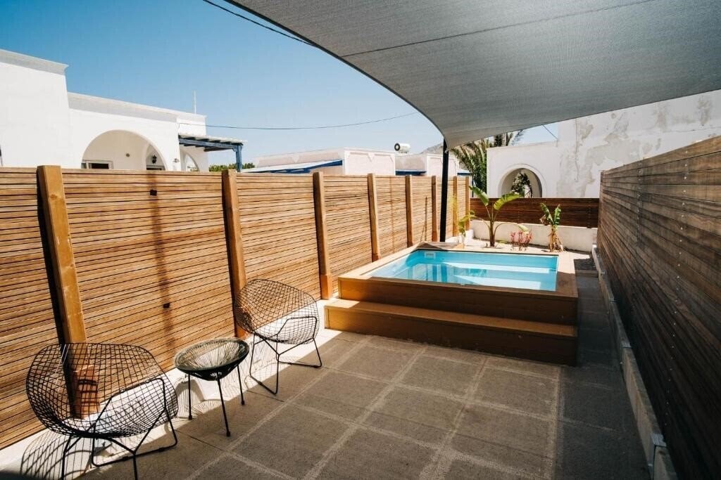 Фото Mesanto Luxury Suites 4*