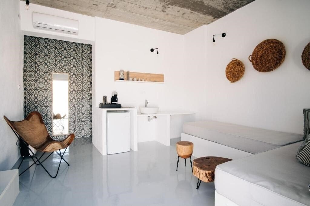 Фотографія Mesanto Luxury Suites 4*