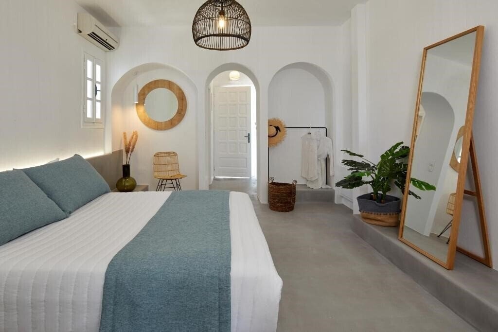 Фото Symmetry Suites (Akrotiri Santorini) 4*
