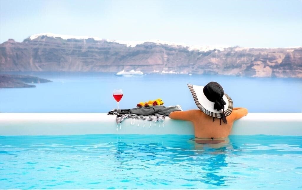 Отель Cape 9 Suites & Villas 5*