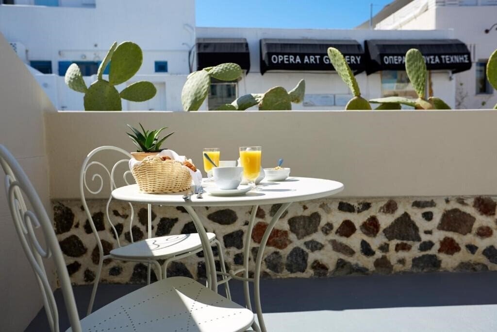 Фотографія Fileria Suites Santorini 4*