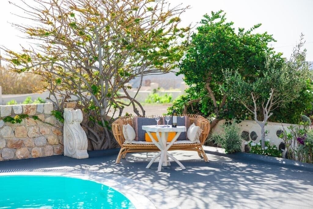 Картинка Theros Houses Santorini 4*
