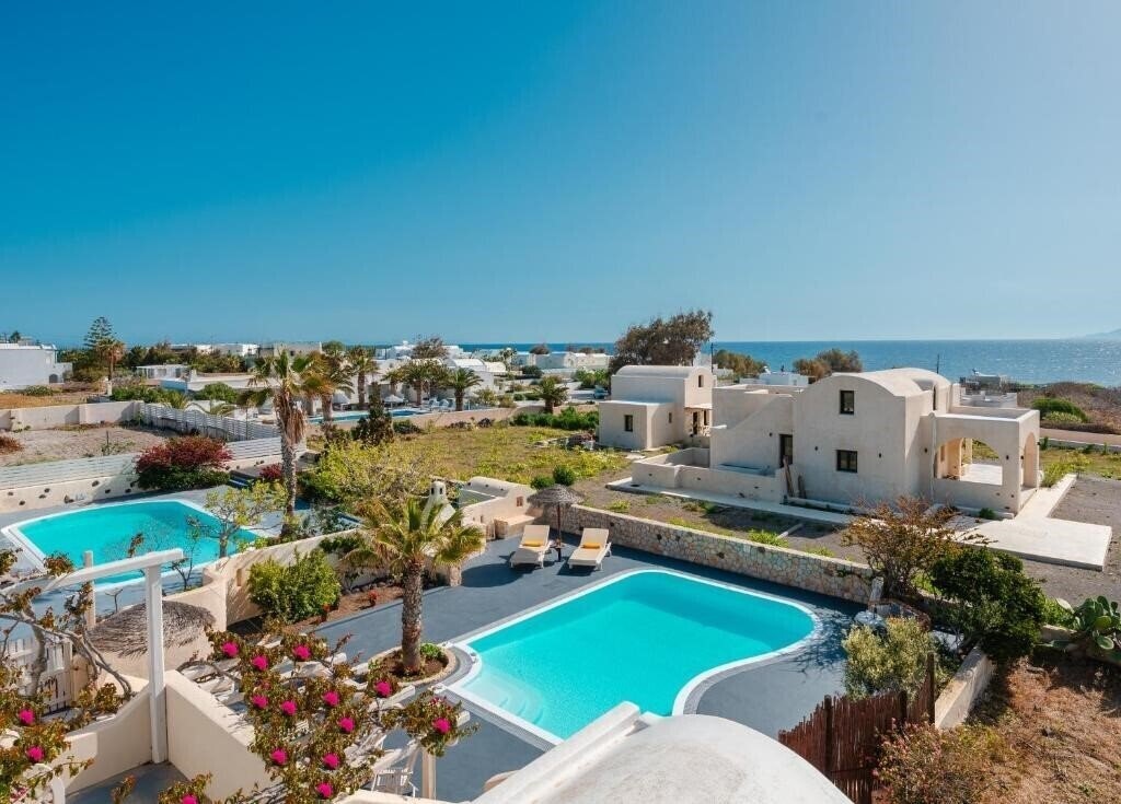 Фотография Theros Houses Santorini 4*