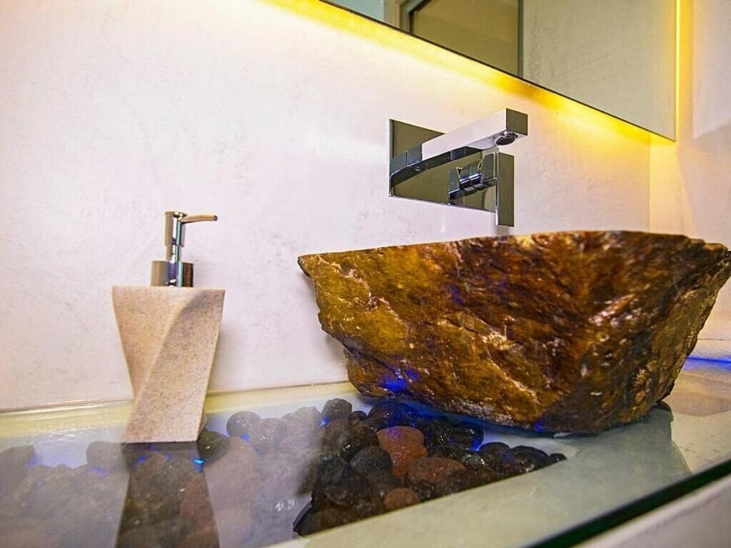 Фото Santorini Loft Boutique Apartments 4*