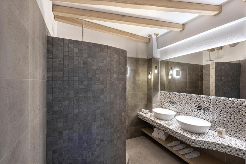 Фотографія Alafropetra Luxury Suites 3*