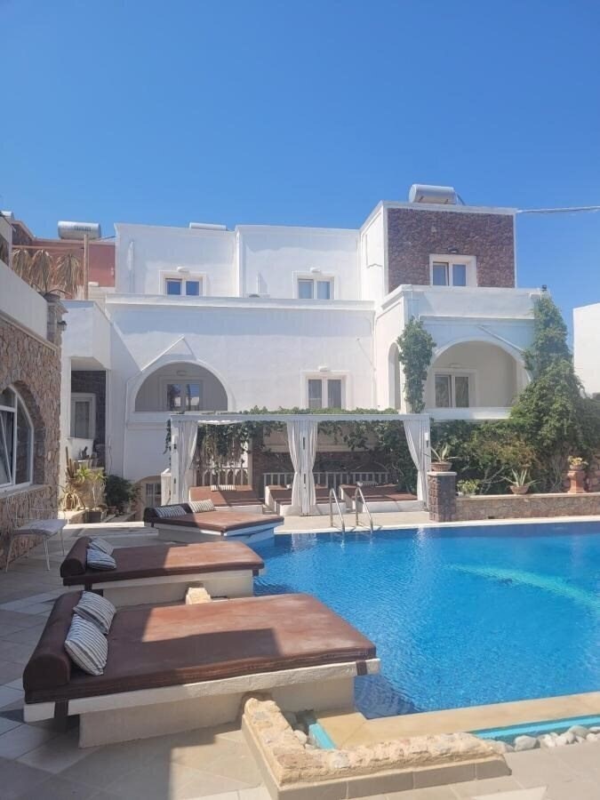 Отель Atalos Suites 3*