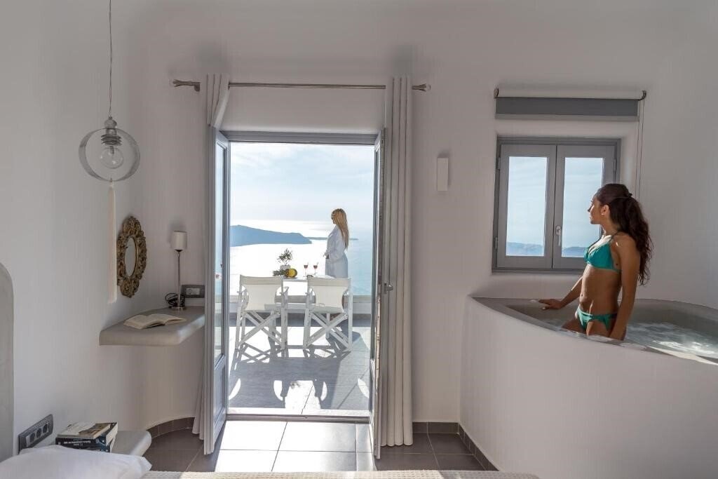 Фотографія Unique Suites 3*
