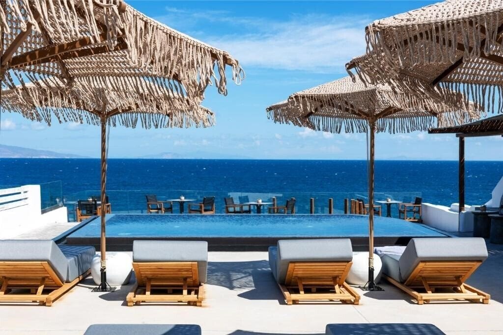 Отель Almyra Oia Suites 4*