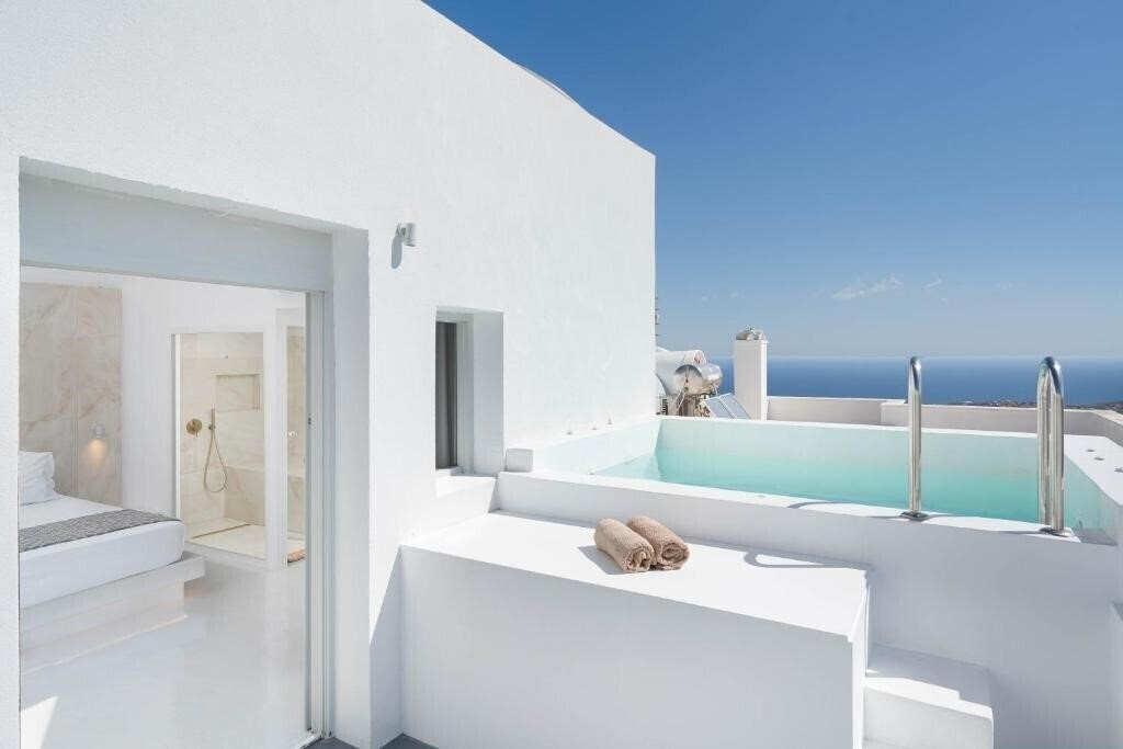 Отель Cycladic Suites 4*