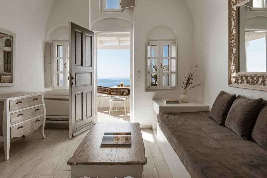 Фото Aqua Luxury Suites Imerovigli 5*