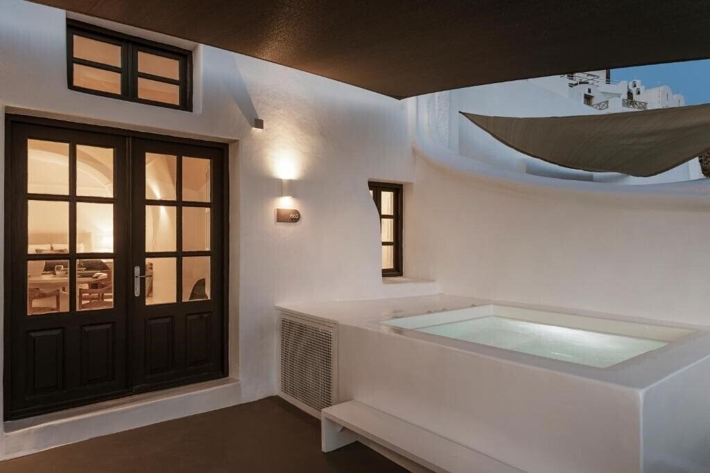 Фотография Aqua Luxury Suites Imerovigli 5*