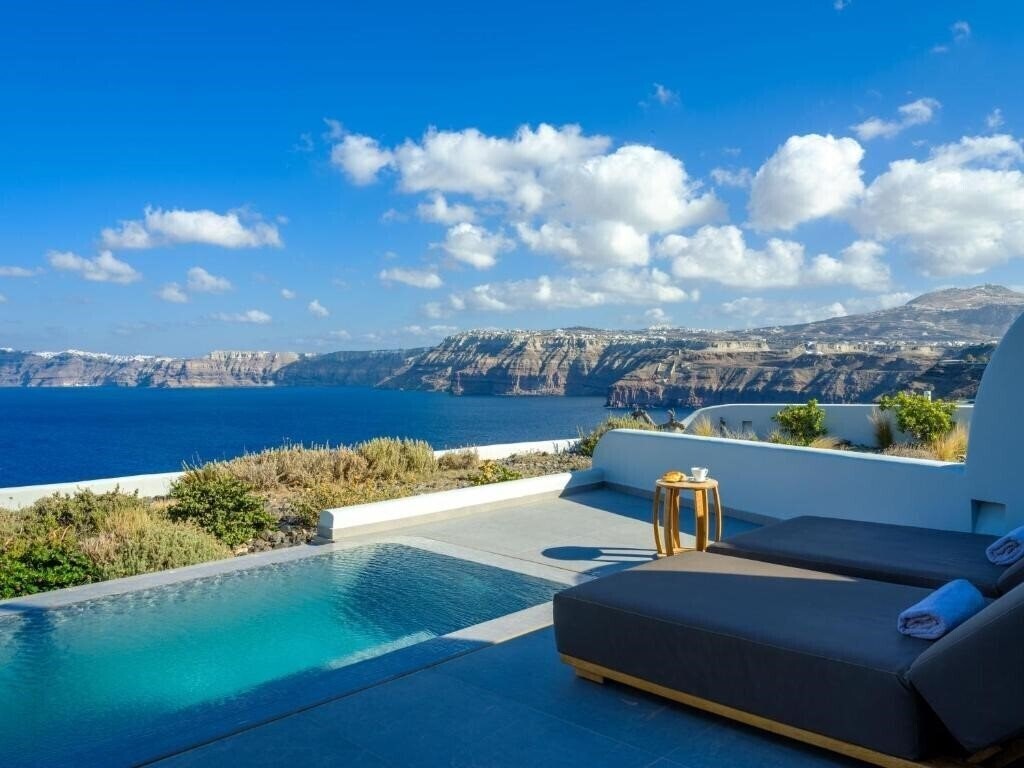 Отель Neptune Luxury SPA Suites 5*
