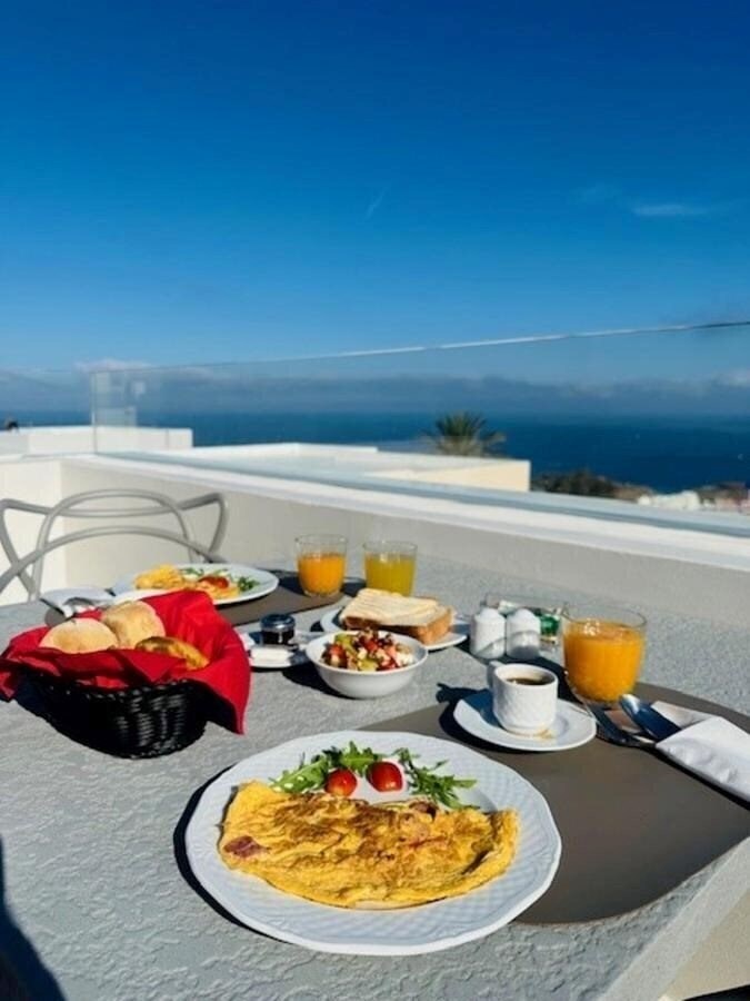 Фото La Madeleine Oia Boutique 4*