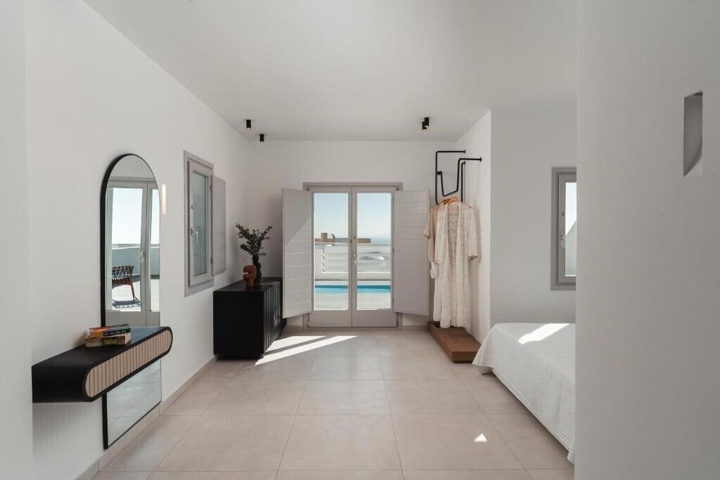 Фото Oikos Santorini Living Concept 5*