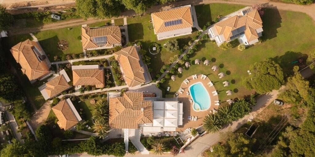 Готель Mandraki Village 4*