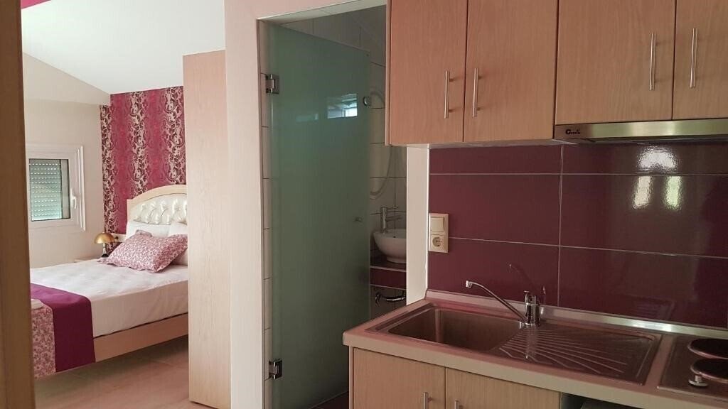 Фотографія Rania Studios апартаменты