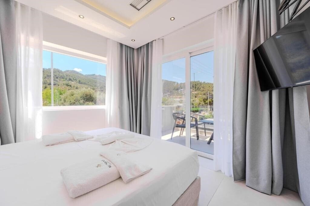 Фото Metsikas Residence Apartments 4*