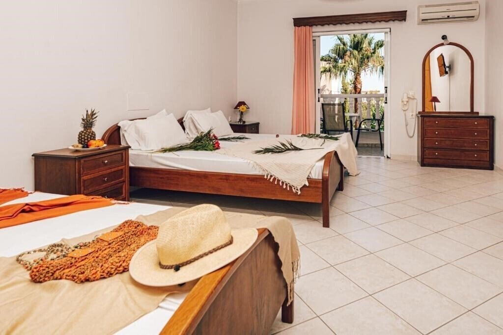 Фотографія Dinos Hotel 3*