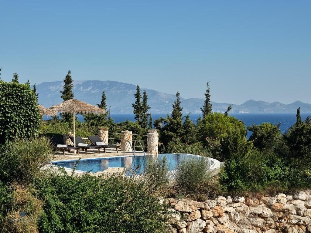 Фотография Blue Caves Villas 4*