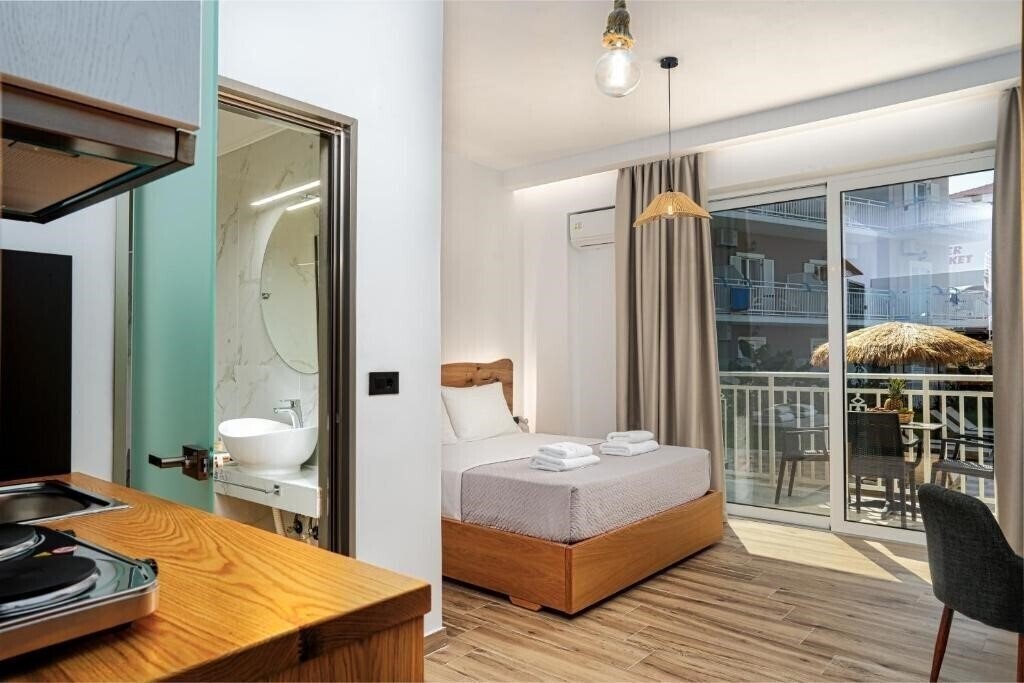 Картинка Amoudi Studios Apartments Hotel 3*