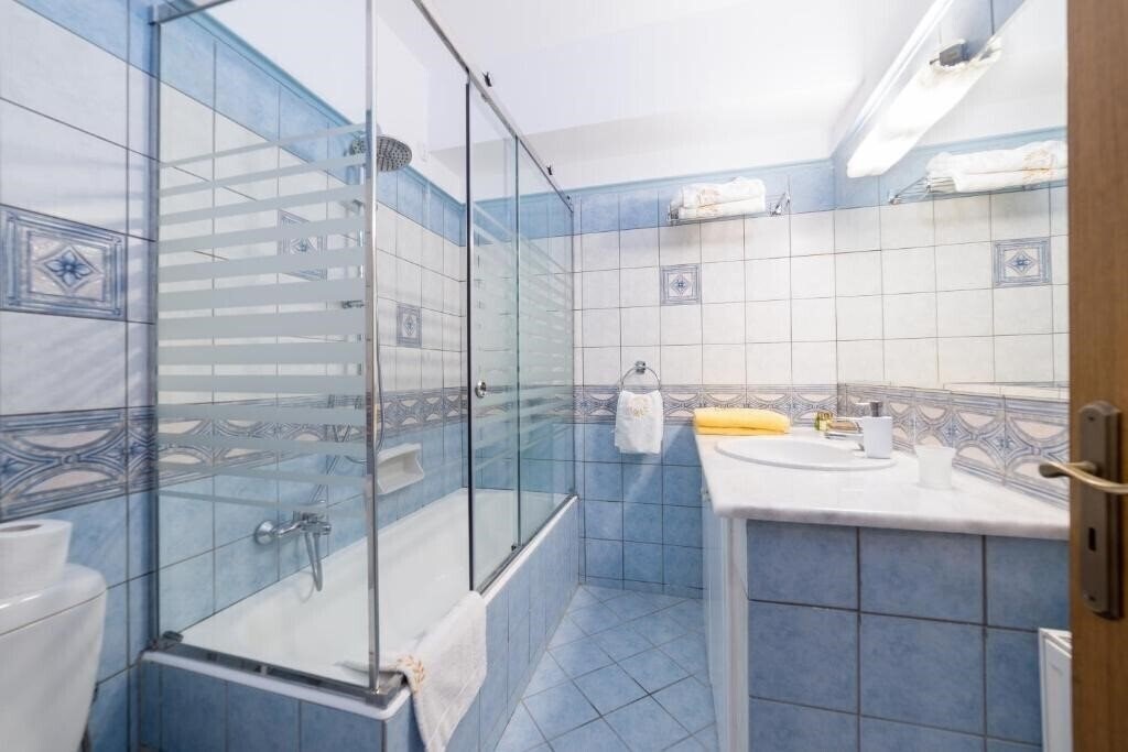 Фотографія Andreolas Luxury Suites 5*