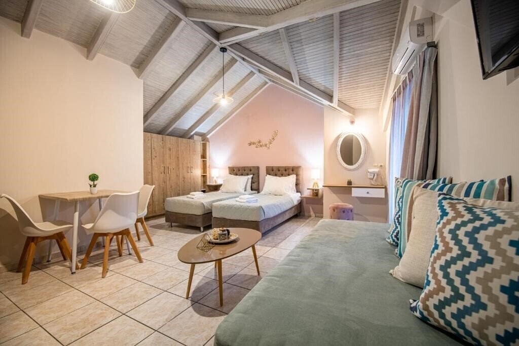 Готель Koukos Loft Apartments апартаменты