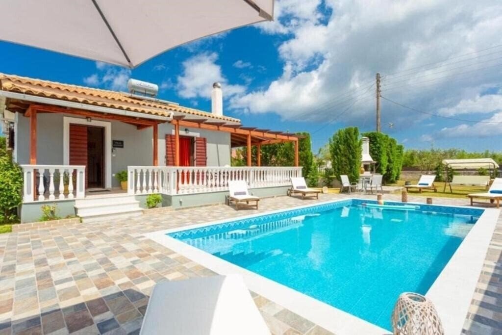 Отель Pothos Villas 4*