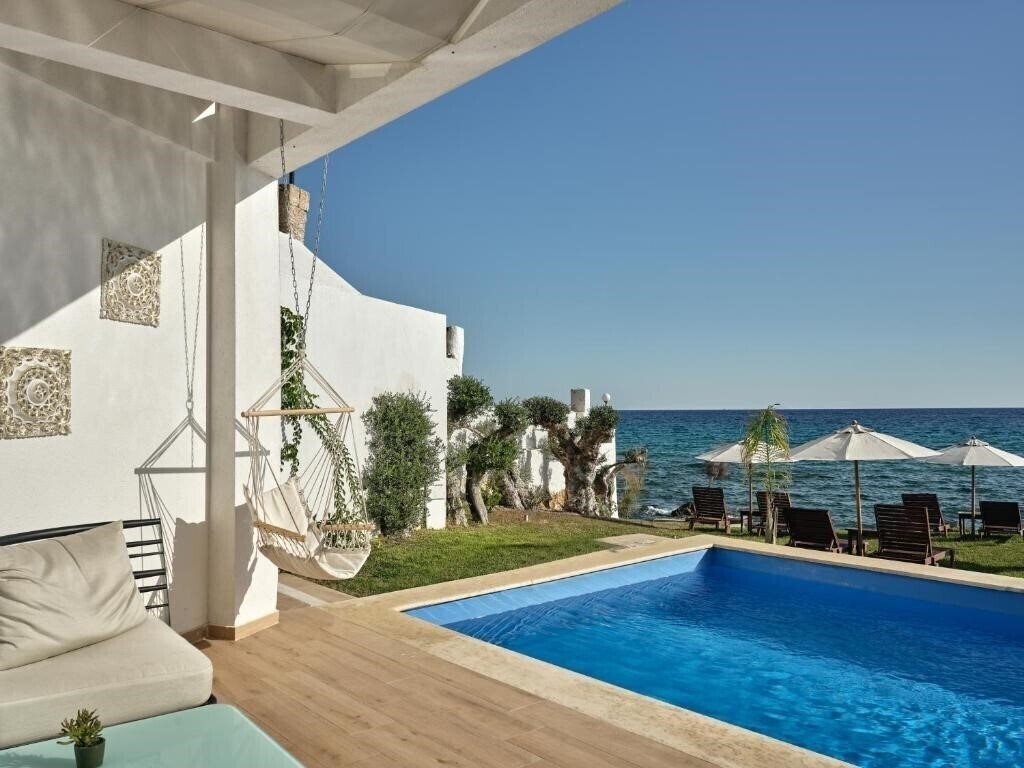 Фотографія Cavo Orient Beach Hotel & Suites (ex. Cepu Orient) 4*