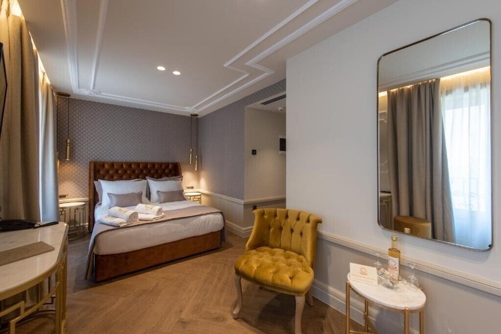 Отель Capolavoro Suites 4*