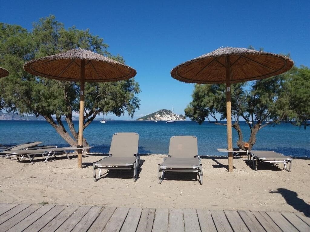 Фотографія Turtle Beach Studios Hotel & Apartments 3*