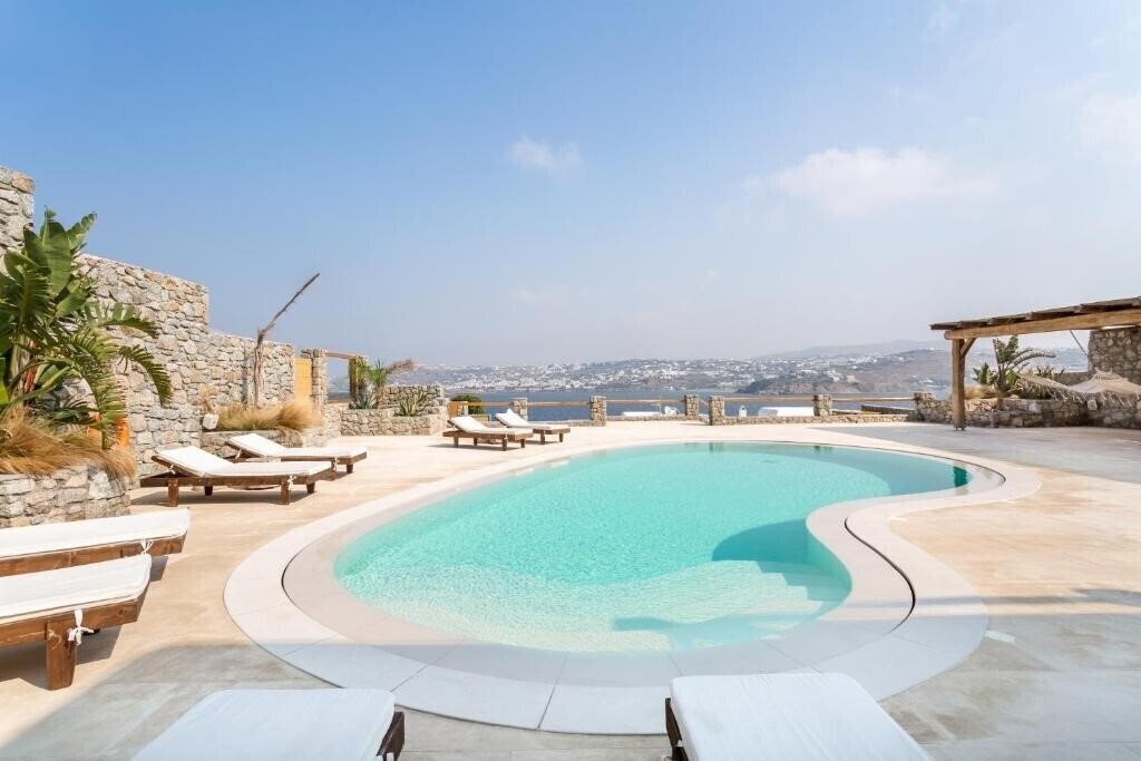 Отель Villa Veneta At Ornos Sea View 4*