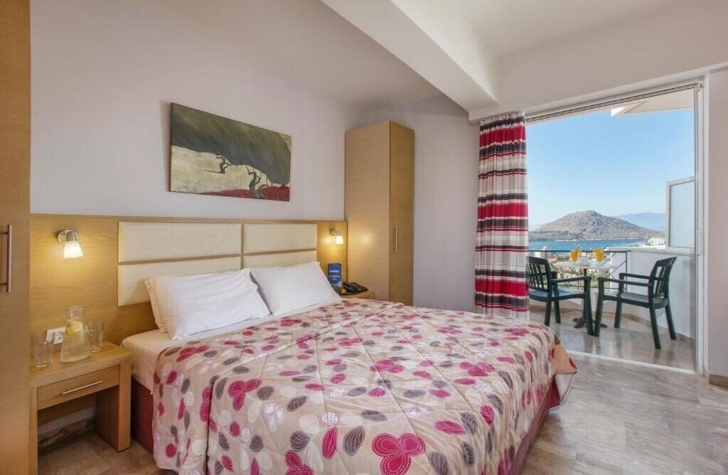 Фото Panorama Hotel & Apartments (ex. Panorama In Tolo) 4*