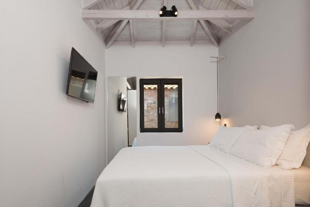 Фото Calme Suites Mani 4*