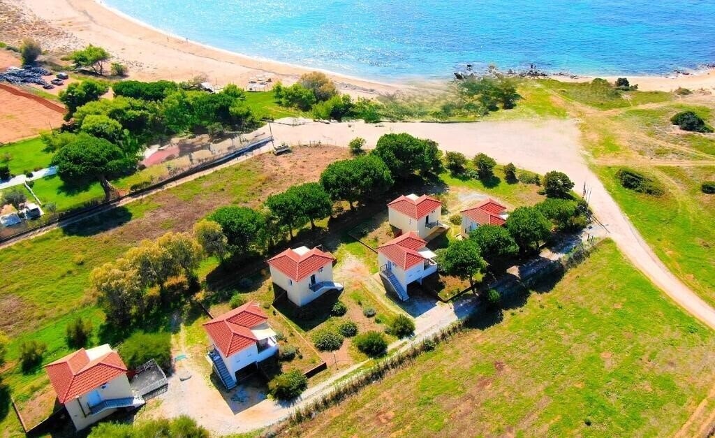 Отель Romanos Beach Villas 4*
