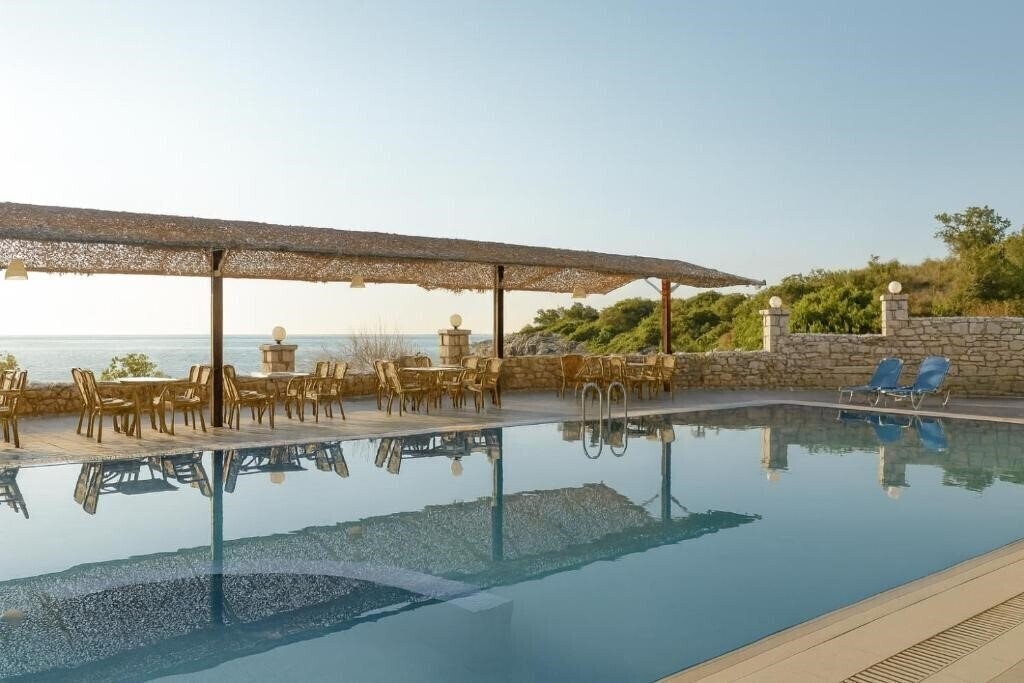 Фотографія Lalloudes Seaside Accommodation 3*