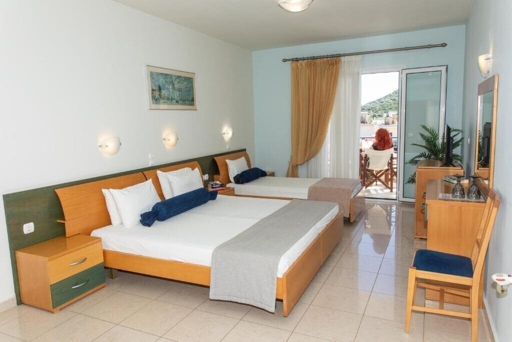 Фото Zeus Paradise Hotel Ammoudia 4*