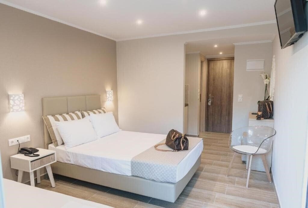 Фото Ammos Beach Seaside Luxury Suites 4*