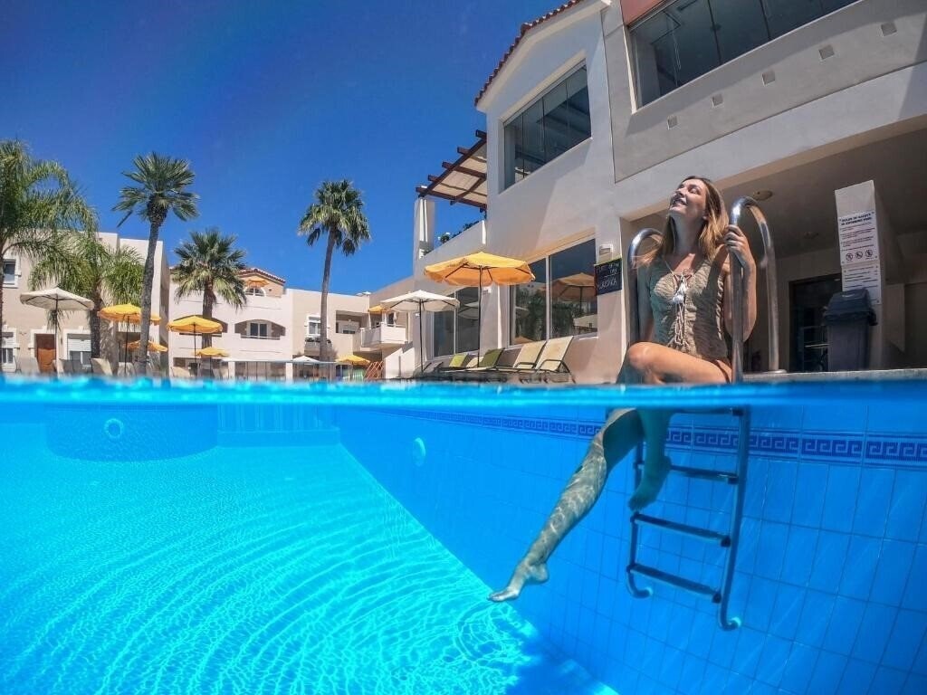 Отель Toxo Hotel & Apartments 3*