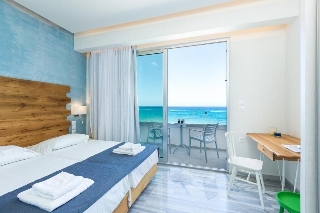 Фото Meltemi Coast Suites 4*