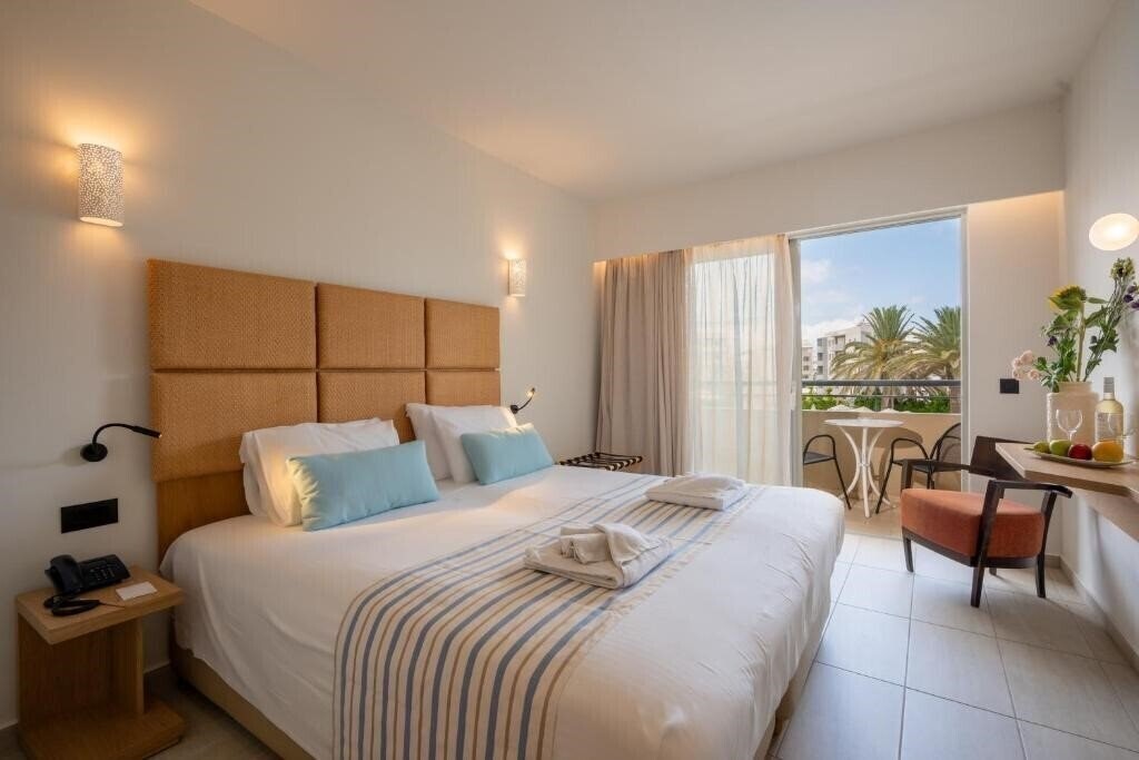Изображение Minos Aparthotel 4*