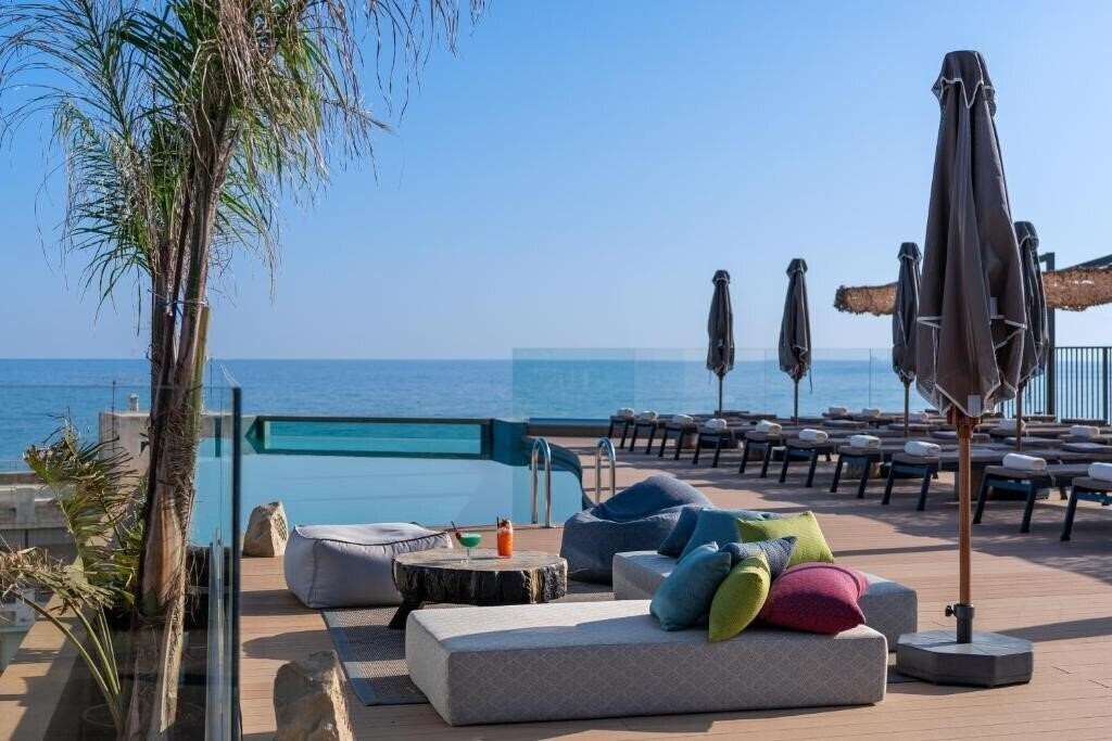 Отель Minos Ambassador All Suites & SPA 5*