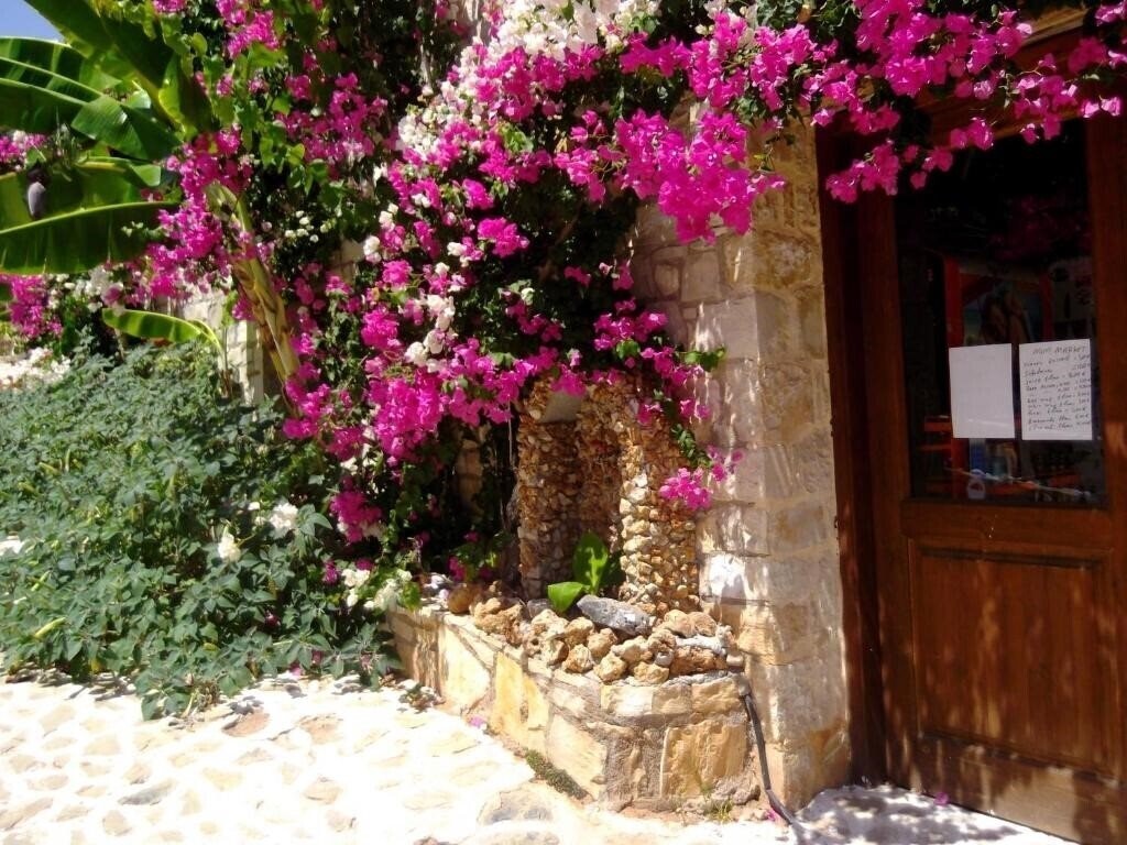 Фото Stone Village Hotel Apartments 4*