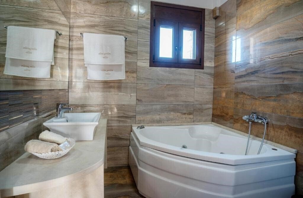 Фотография Olive Garden Villas 4*