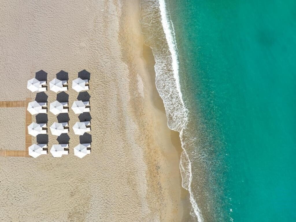 Фото Calla Luxury Seafront Suites 5*