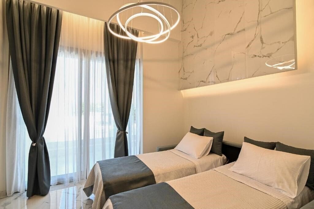 Картинка Rihios Hotel апартаменты