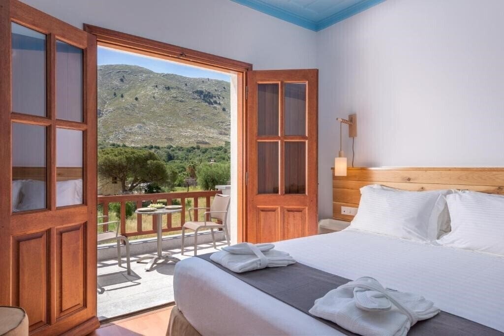 Фото A Symi Residences 4*