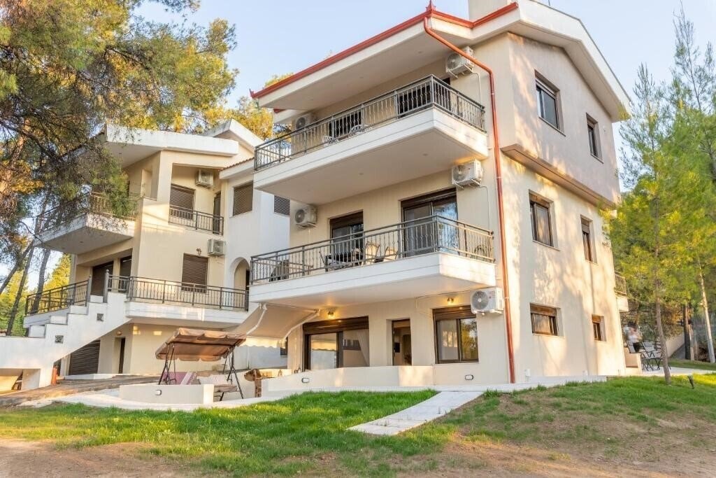 Отель Natura Suites 3*