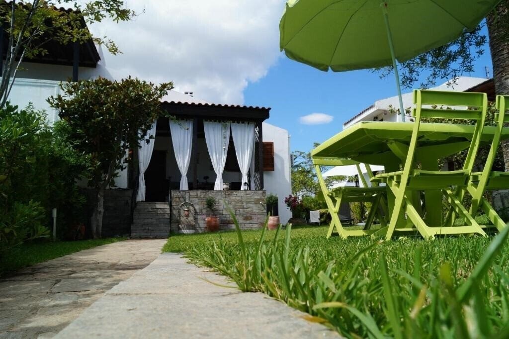 Изображение Trikorfo Beach Maisonettes Apartments апартаменты